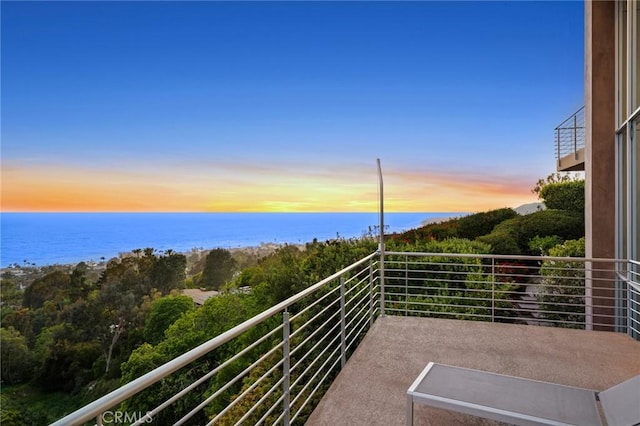 856 Diamond, Laguna Beach, CA 92651 - balcony at dusk featuring a water view