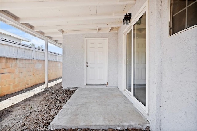 23821 Norma Dr, Menifee, CA 92587 - entrance to property featuring fence, stucco siding, and a patio area