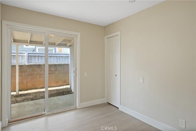23821 Norma Dr, Menifee, CA 92587 - empty room featuring light wood-type flooring and baseboards