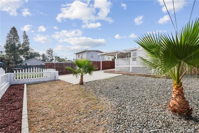 23821 Norma Dr, Menifee, CA 92587 - fenced yard with a patio