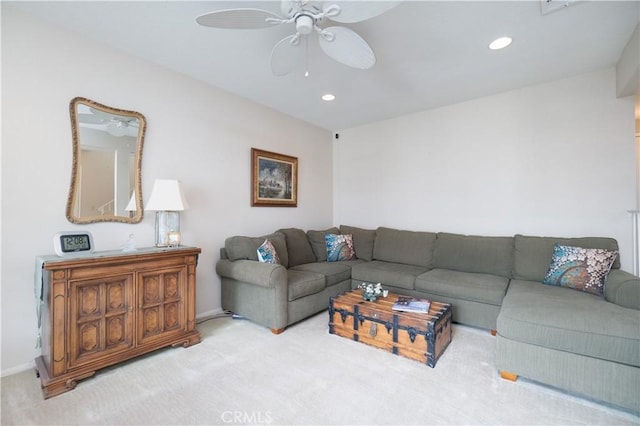 living area with ceiling fan, carpet flooring, baseboards, and recessed lighting