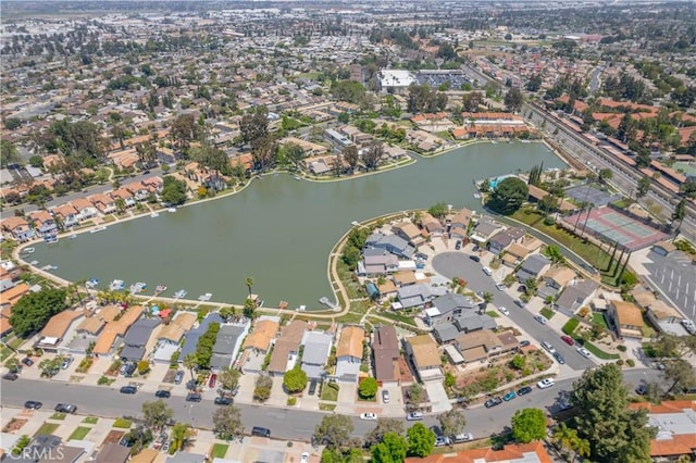 aerial view with a water view and a residential view