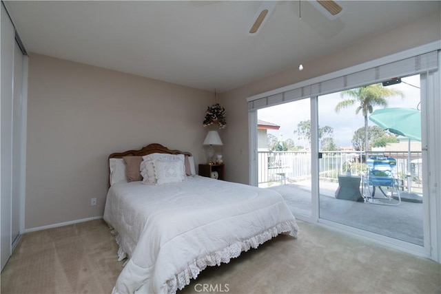 bedroom with carpet, baseboards, a ceiling fan, and access to exterior