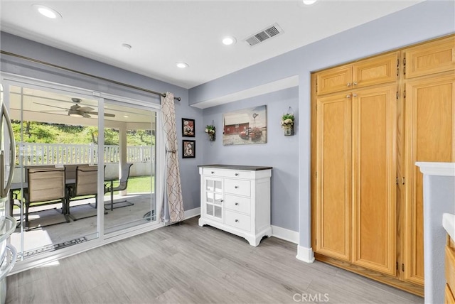 bedroom featuring visible vents, recessed lighting, light wood-style flooring, baseboards, and access to exterior