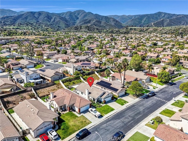 976 Miraflores Dr, Corona, CA 92882 - aerial perspective of suburban area featuring a mountainous background