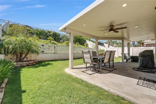 976 Miraflores Dr, Corona, CA 92882 - fenced backyard with ceiling fan and a patio