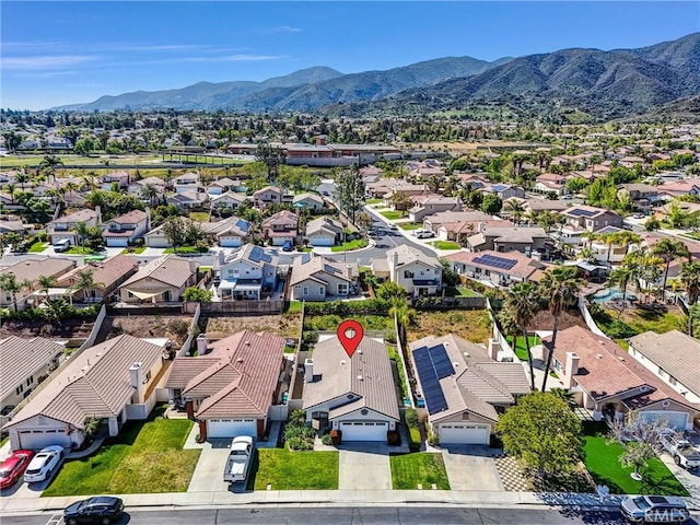 drone / aerial view with a residential view and a mountain view