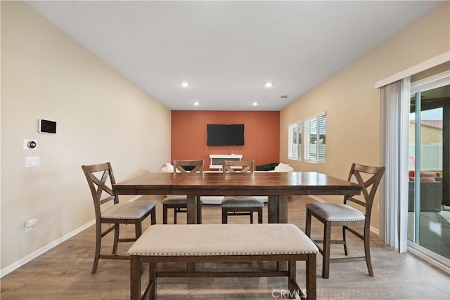 26643 Baneberry Ct, Menifee, CA 92585 - dining space featuring light wood-style flooring, baseboards, and recessed lighting