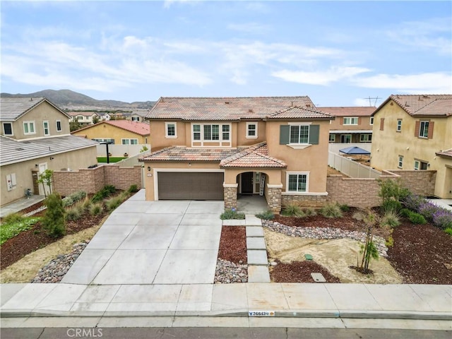 26643 Baneberry Ct, Menifee, CA 92585 - view of front of house with stucco siding, a tiled roof, a residential view, and driveway