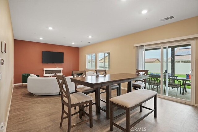26643 Baneberry Ct, Menifee, CA 92585 - dining area featuring recessed lighting, baseboards, and light wood-style floors