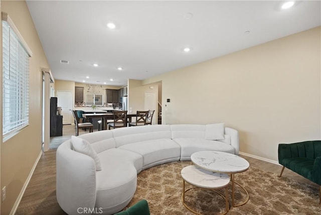 26643 Baneberry Ct, Menifee, CA 92585 - living room with recessed lighting, baseboards, and wood finished floors
