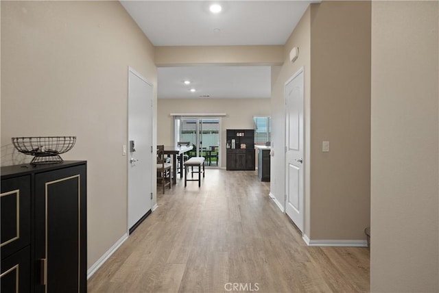 26643 Baneberry Ct, Menifee, CA 92585 - corridor with light wood finished floors, recessed lighting, and baseboards