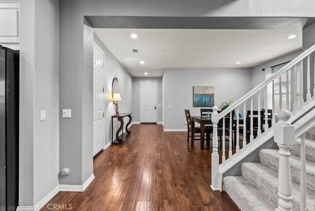 19321 Carranza Ln, Saugus, CA 91350 - foyer featuring stairway, recessed lighting, baseboards, and wood finished floors