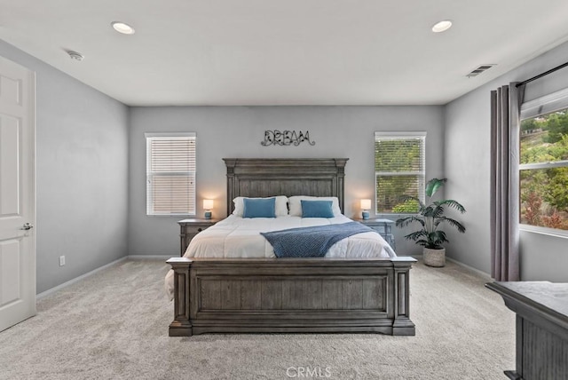 19321 Carranza Ln, Saugus, CA 91350 - bedroom with baseboards, multiple windows, and light carpet