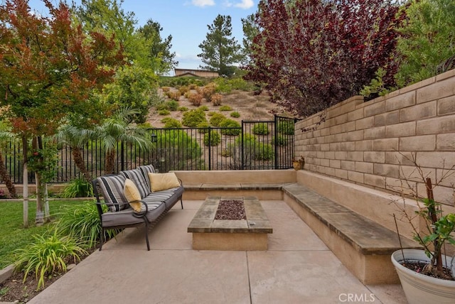 19321 Carranza Ln, Saugus, CA 91350 - view of patio with an outdoor living space with a fire pit and a fenced backyard