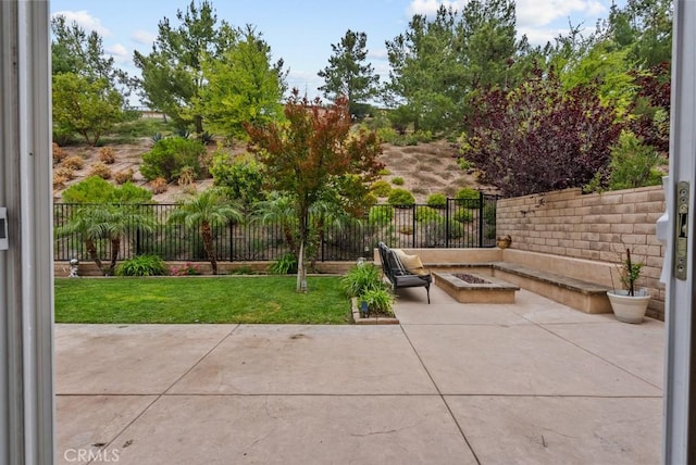 19321 Carranza Ln, Saugus, CA 91350 - view of patio / terrace featuring an outdoor fire pit and a fenced backyard