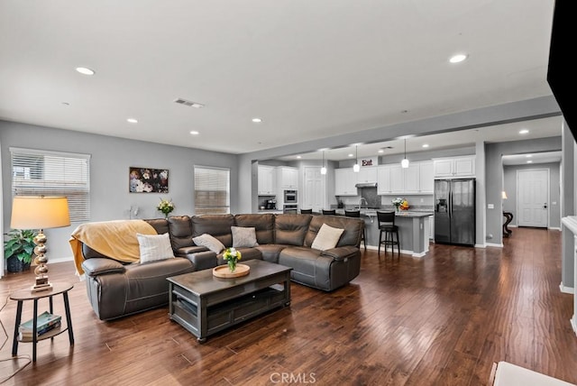 19321 Carranza Ln, Saugus, CA 91350 - living area with baseboards, recessed lighting, visible vents, and dark wood-type flooring