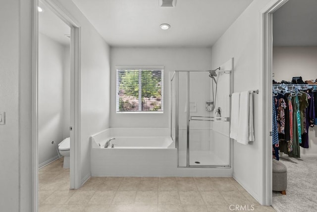 19321 Carranza Ln, Saugus, CA 91350 - bathroom featuring a stall shower, toilet, a spacious closet, and a garden tub