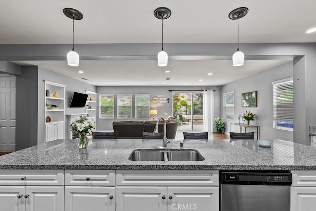 19321 Carranza Ln, Saugus, CA 91350 - kitchen featuring a sink, dishwasher, white cabinetry, open floor plan, and a wealth of natural light