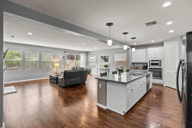 19321 Carranza Ln, Saugus, CA 91350 - kitchen with a sink, stainless steel appliances, open floor plan, and recessed lighting