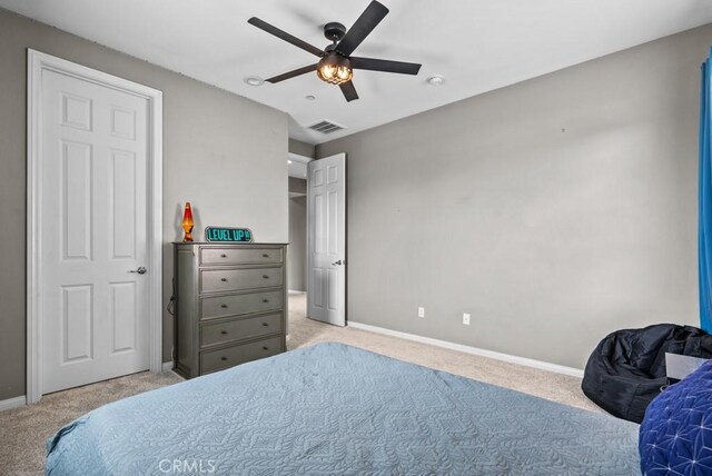 19321 Carranza Ln, Saugus, CA 91350 - bedroom featuring light carpet, baseboards, visible vents, and ceiling fan