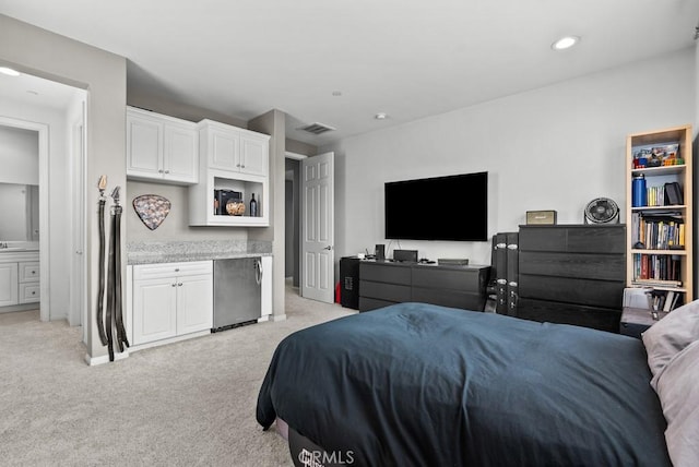 19321 Carranza Ln, Saugus, CA 91350 - bedroom with light colored carpet, a dry bar, visible vents, and refrigerator