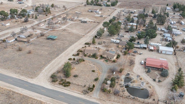 aerial view featuring a rural view and a desert view