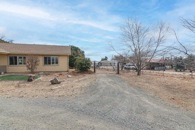 view of front of home with a gate and fence