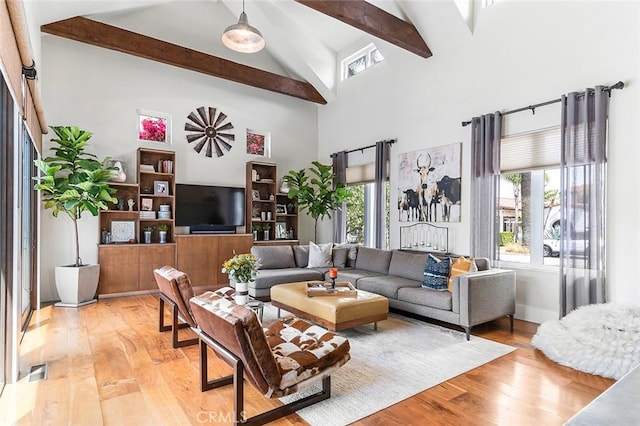 291 Argonne Ave, Long Beach, CA 90803 - living room with high vaulted ceiling, beam ceiling, light wood-style flooring, and plenty of natural light