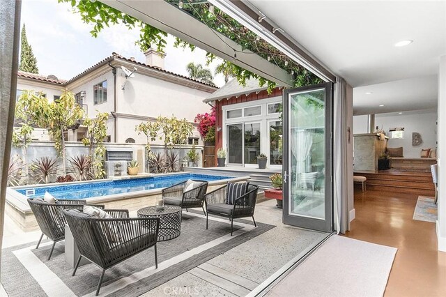 291 Argonne Ave, Long Beach, CA 90803 - fenced backyard with outdoor lounge area
