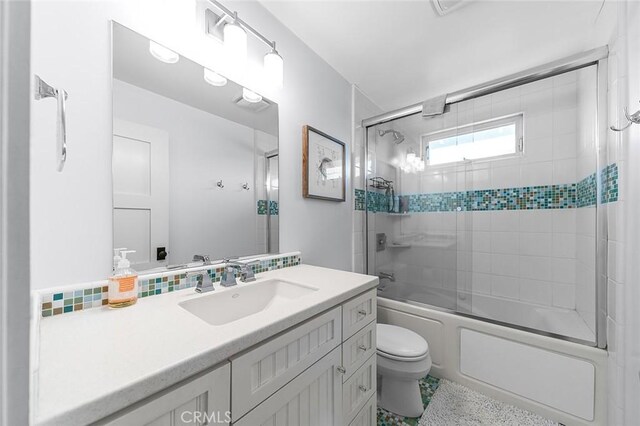 291 Argonne Ave, Long Beach, CA 90803 - bathroom with vanity, bath / shower combo with glass door, and speckled floor