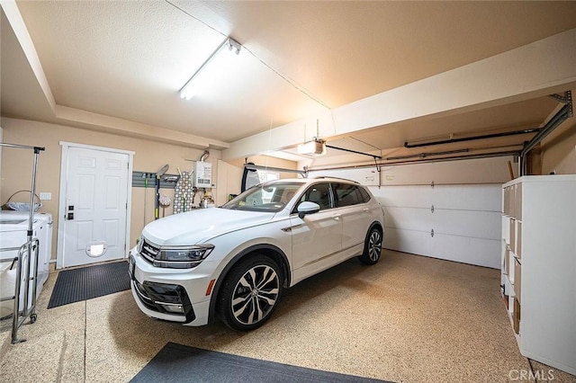 291 Argonne Ave, Long Beach, CA 90803 - garage with a garage door opener and washing machine and clothes dryer