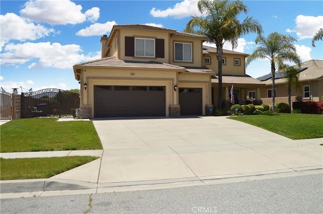 13622 Canyon Crest Rd, Yucaipa, CA 92399 - view of front of house featuring a garage, stucco siding, driveway, a gate, and a tiled roof