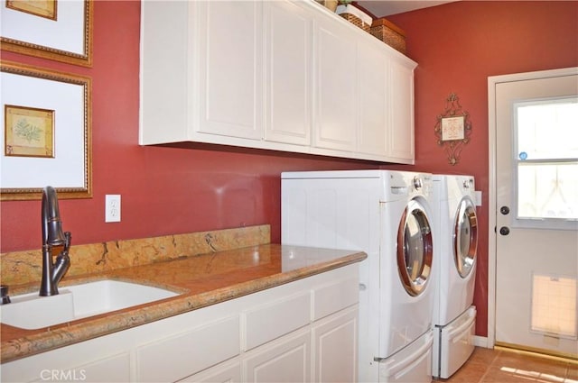 13622 Canyon Crest Rd, Yucaipa, CA 92399 - washroom with independent washer and dryer, cabinet space, and light tile patterned floors