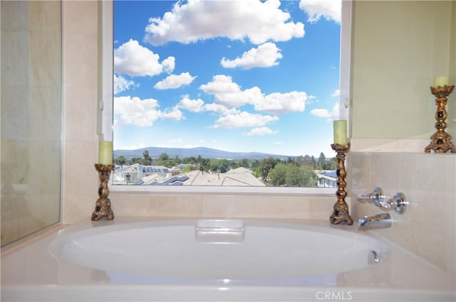 13622 Canyon Crest Rd, Yucaipa, CA 92399 - full bathroom featuring a mountain view and a bath