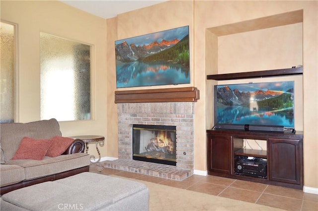 13622 Canyon Crest Rd, Yucaipa, CA 92399 - tiled living area featuring a brick fireplace and baseboards