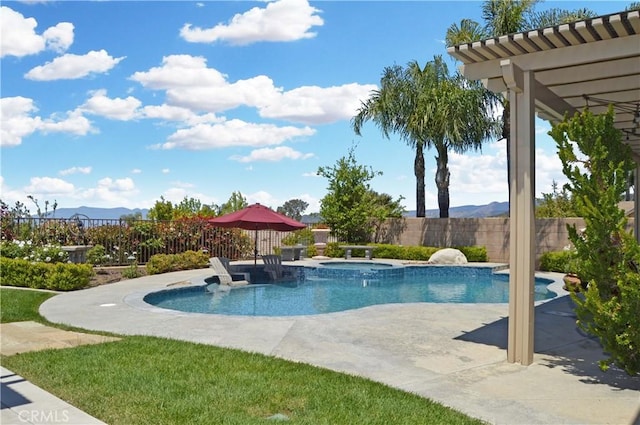 13622 Canyon Crest Rd, Yucaipa, CA 92399 - view of pool with an in-ground hot tub, a fenced backyard, a mountain view, and a patio area