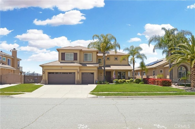13622 Canyon Crest Rd, Yucaipa, CA 92399 - view of front of home featuring an attached garage, driveway, and stucco siding