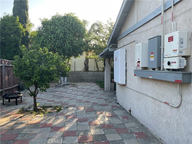 322 N Fillmore Ave, Rialto, CA 92376 - view of patio featuring a fire pit