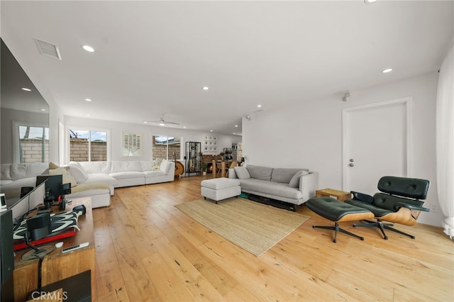 19542 Constellation Ln, Huntington Beach, CA 92646 - living area featuring ceiling fan, recessed lighting, visible vents, and wood-type flooring