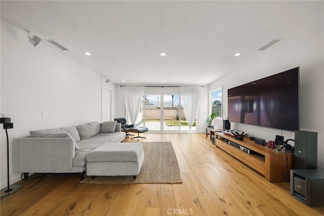 19542 Constellation Ln, Huntington Beach, CA 92646 - living room with light wood-type flooring, recessed lighting, and visible vents