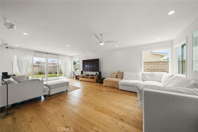 19542 Constellation Ln, Huntington Beach, CA 92646 - living area featuring light wood finished floors, ceiling fan, and recessed lighting