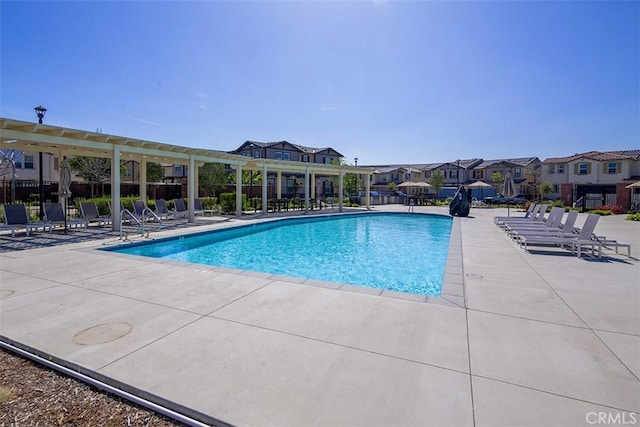 7343 Anise Ln, Chino, CA 91708 - community pool featuring a residential view, a patio area, fence, and a pergola