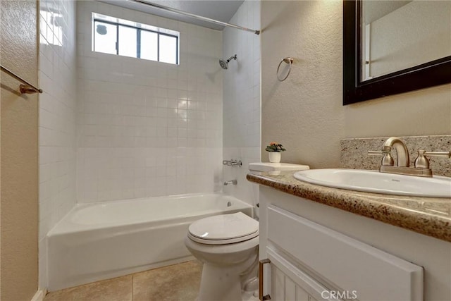 4560 Cleveland Ave Unit 101, San Diego, CA 92116 - full bath featuring toilet, a textured wall, bathtub / shower combination, vanity, and tile patterned floors