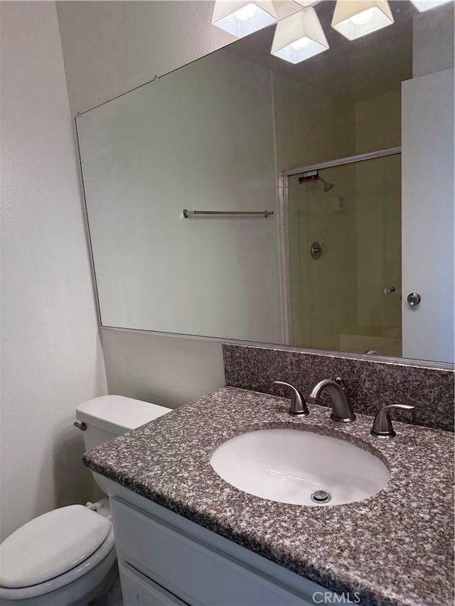 20821 E Calora St Unit E1, Covina, CA 91724 - bathroom with vanity, toilet, a shower with door, and a skylight