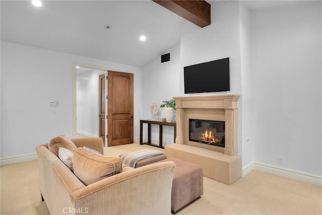 carpeted living area featuring recessed lighting, a glass covered fireplace, and baseboards