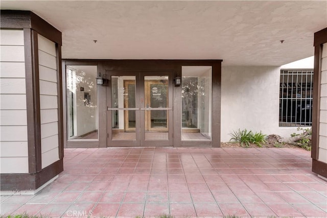 3955 Faircross Pl Unit 48, San Diego, CA 92115 - property entrance with a patio, stucco siding, and french doors
