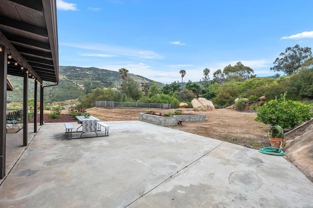 view of patio featuring a mountain view