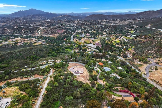 drone / aerial view featuring a mountain view