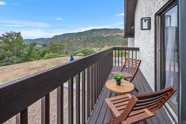 balcony featuring a mountain view